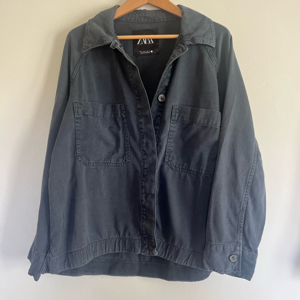 Dusty blue woman's jacket.